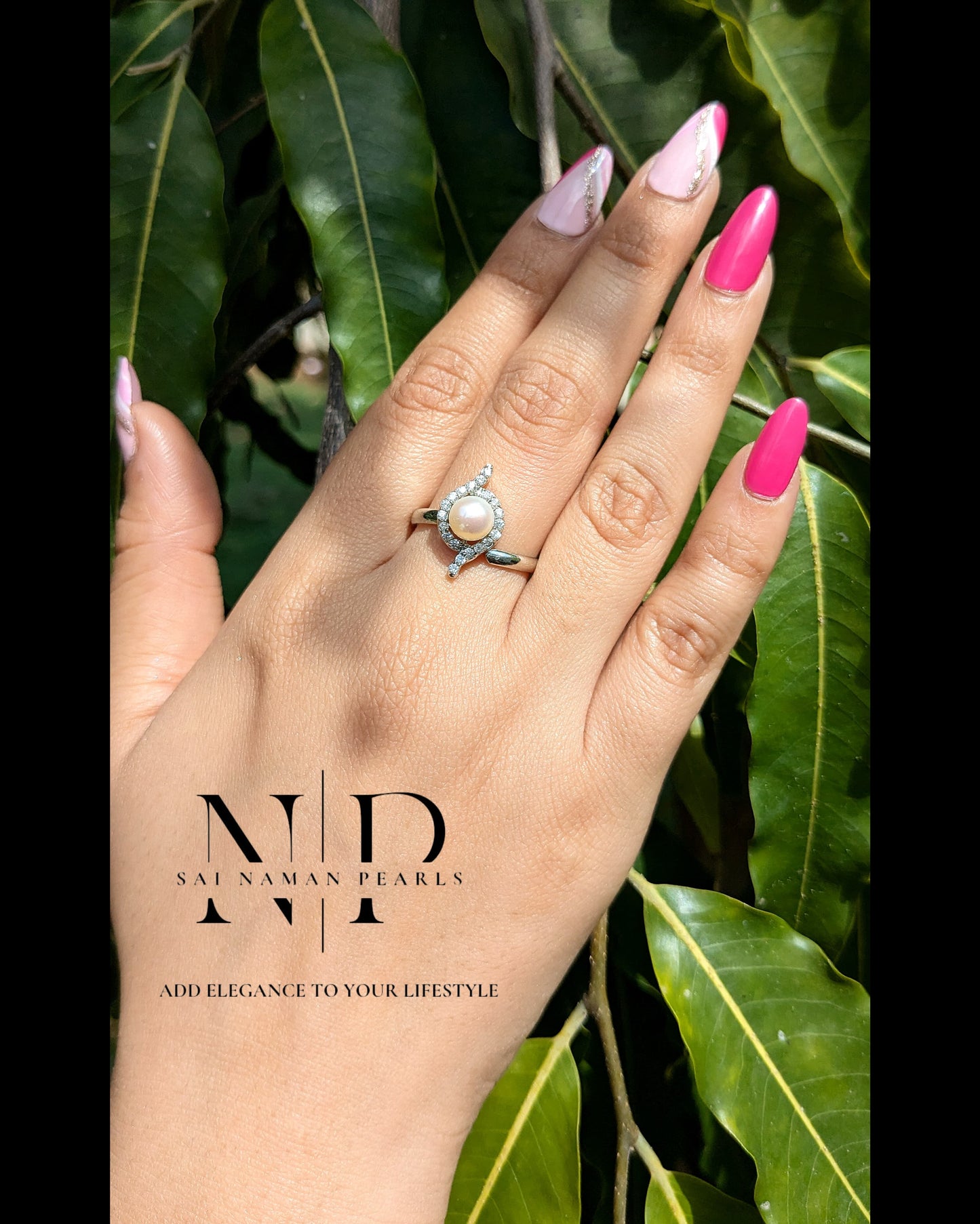 ADJUSTABLE S SILVER PEARL RING.