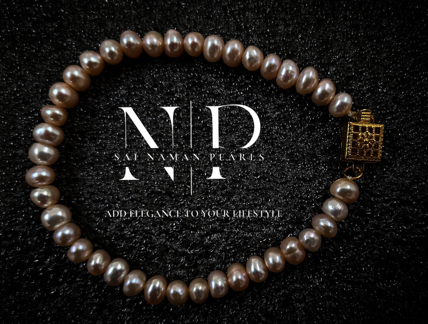 PINK FLAT PEARL BRACELET