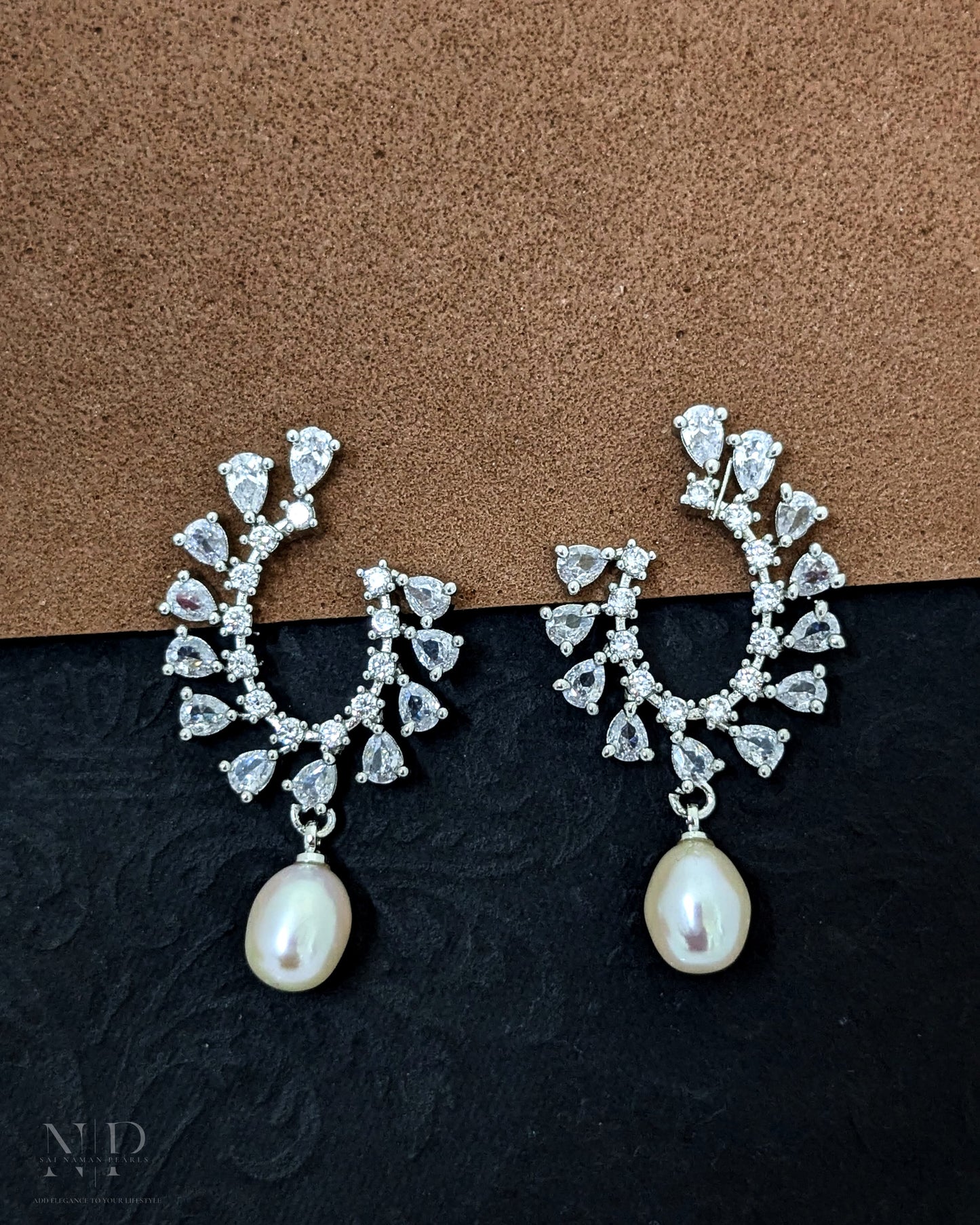 ROYAL REAL PEARLS EARRINGS WITH CZ WORK.